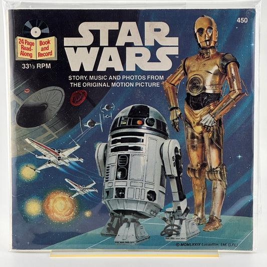 Record cover with R2D2 & C3PO droids with a starship battle scene in the background under classic Star Wars logo. 33 1/3 RPM