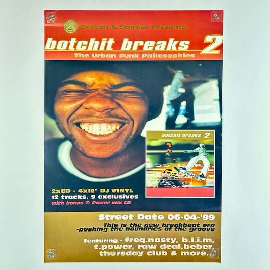 Poster with man grinning next to album artwork with text banners at top and bottom. 