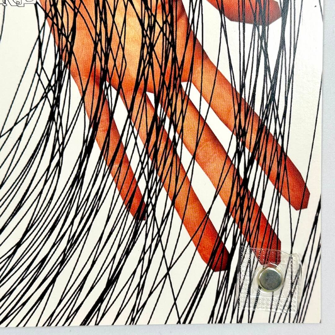 Bottom right corner of poster with crisp corner and clean edges showing mint condition. 