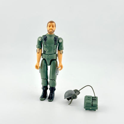 GI Joe action figure with accessories against white background. 