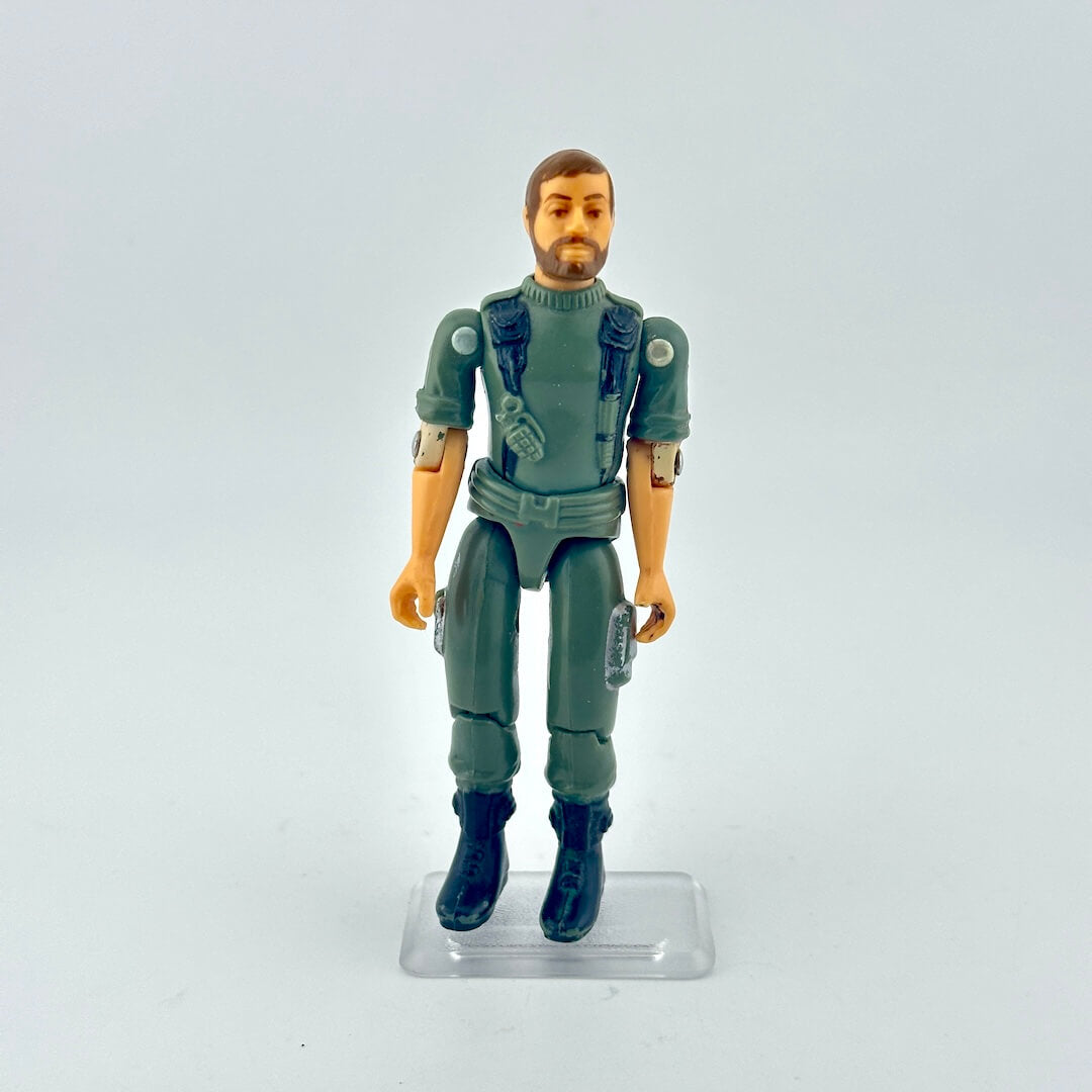 Action figure in green uniform on a white background