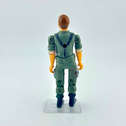 Toy figure in a green outfit on a white background