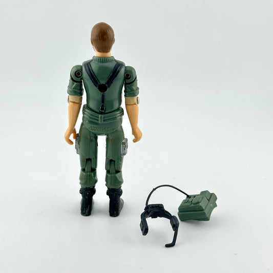 Toy figure in green uniform with a weapon on a white background