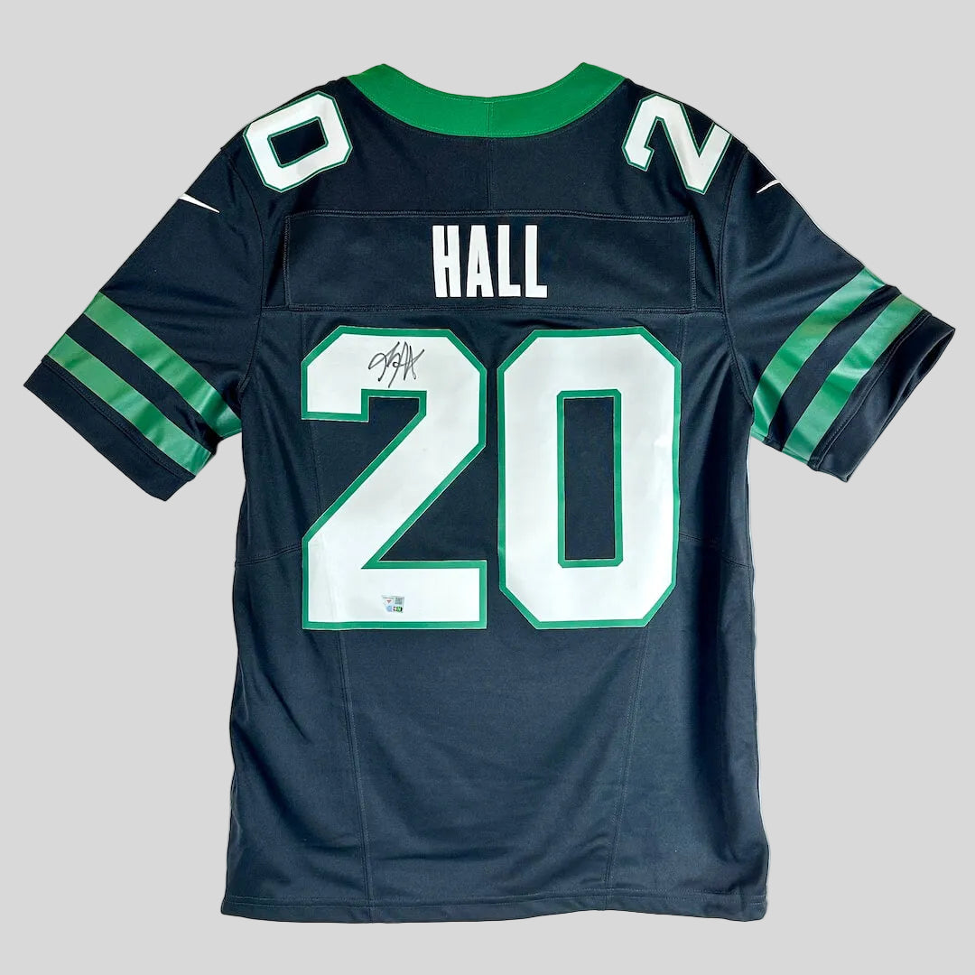 A black Jets football jersey with 'HALL' and the number '20' on the back, featuring a green collar, and a black autograph.