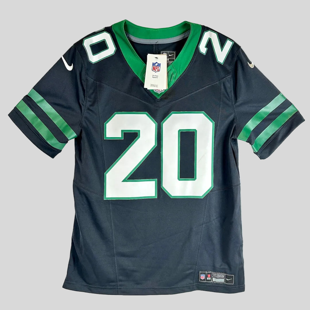 A Nike Jets jersey with green and white accents and the number '20' on front and on shoulders. 