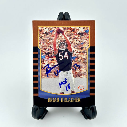 Autographed sports trading card of a football player on a display stand with a white background