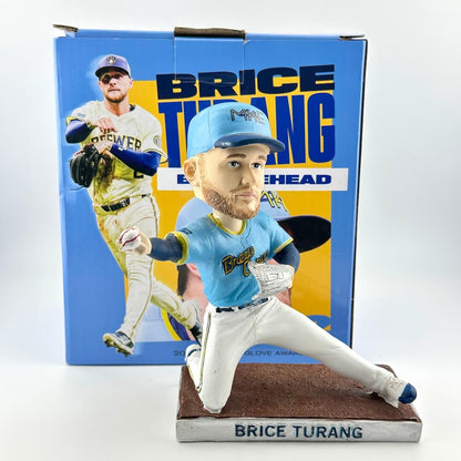 Baseball bobblehead figure of Brice Turang in front of his packaging