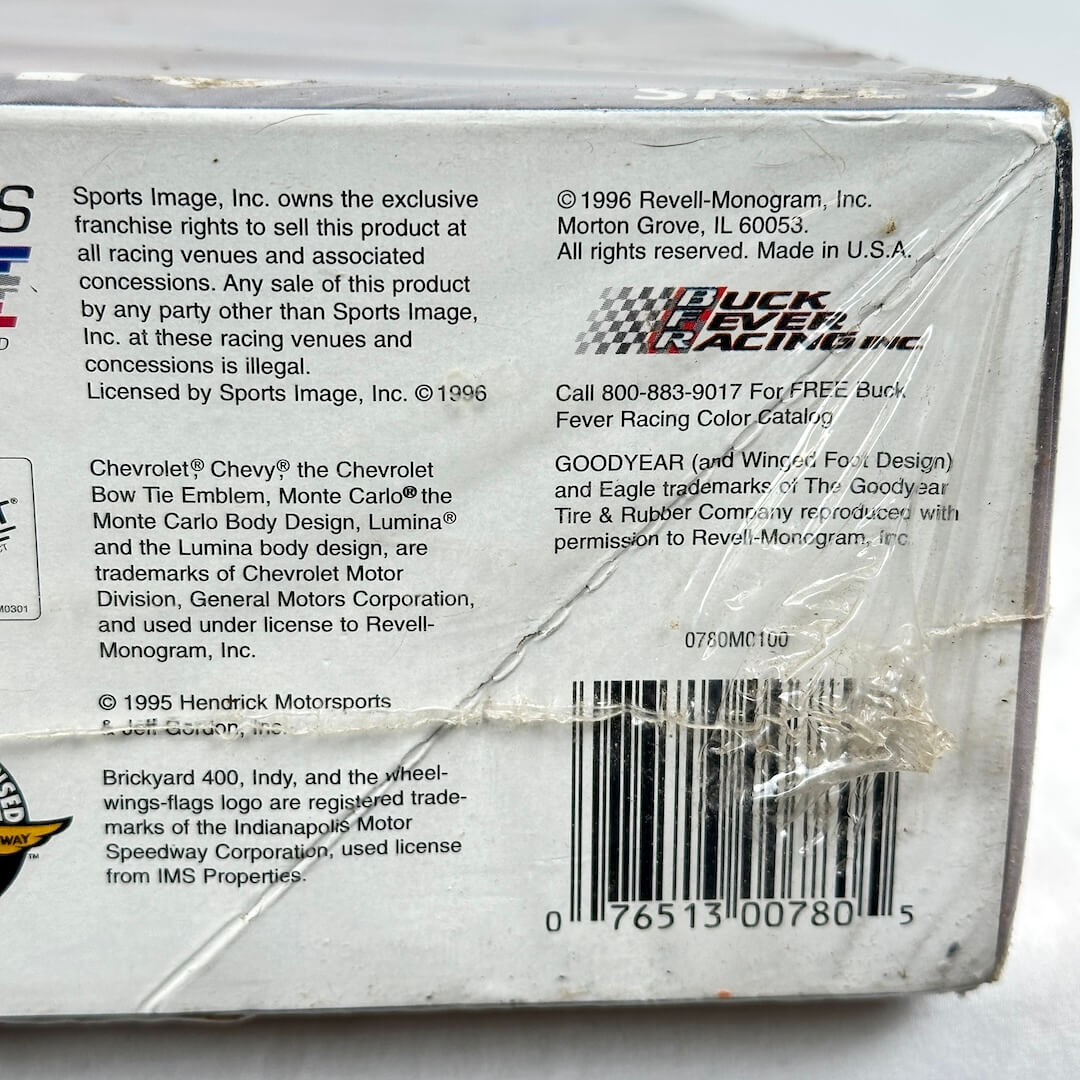 Back of a model car box with branding and text