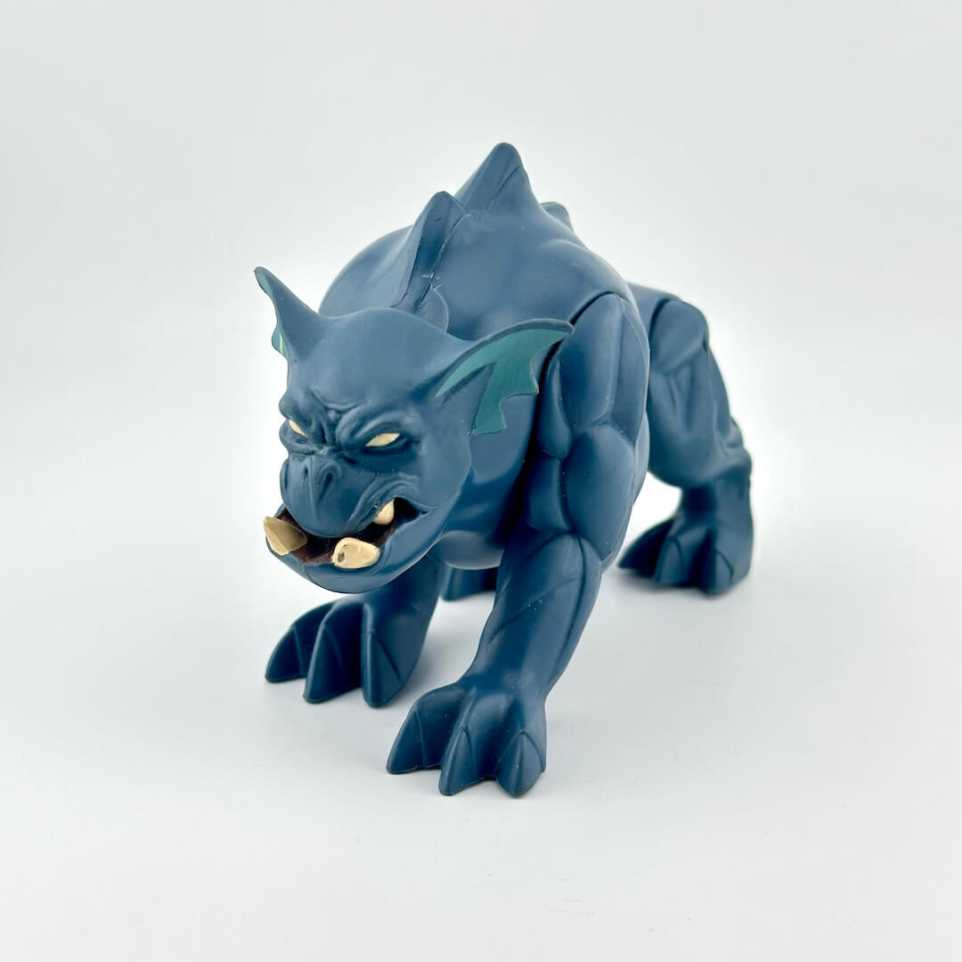 Action figure of blue dog-like creature. 