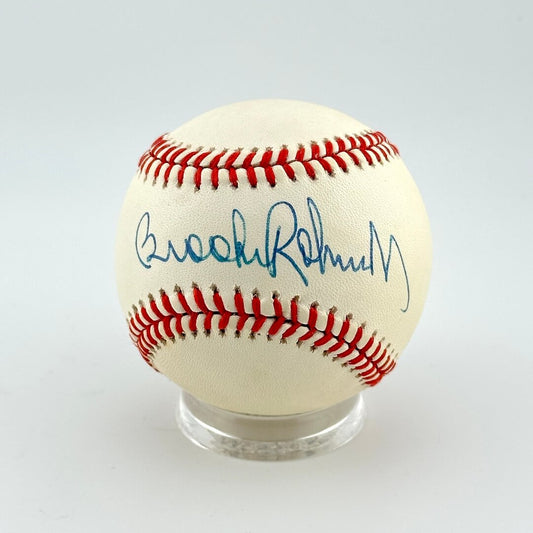 Baseball with autograph on a white background