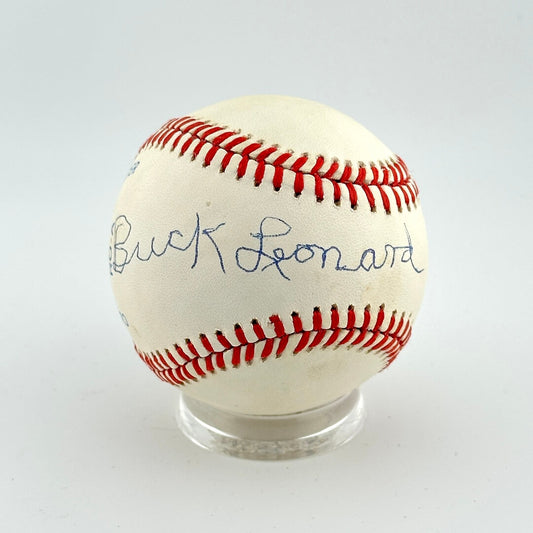 Baseball with autograph on a white background