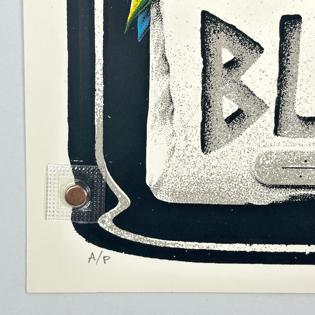 Bottom left corner of poster showing clean edges and sharp corner, artist penciled "A/P" at corner. 