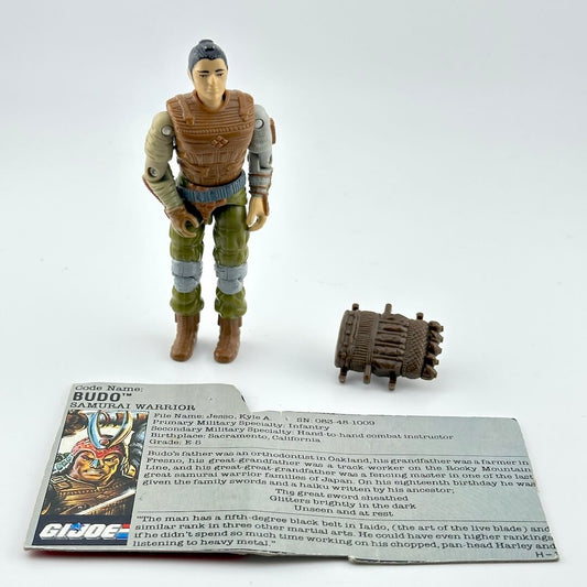 Action figure with accessories and character card on a white background