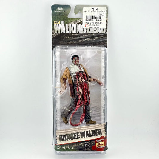 The Walking Dead Series 6 Bungee Walker action figure in its original packaging, featuring a detailed zombie character.