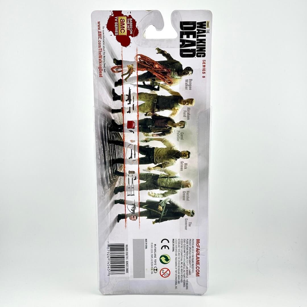Packaged action figure from The Walking Dead Series 6, shown in its original vertical blister card packaging.