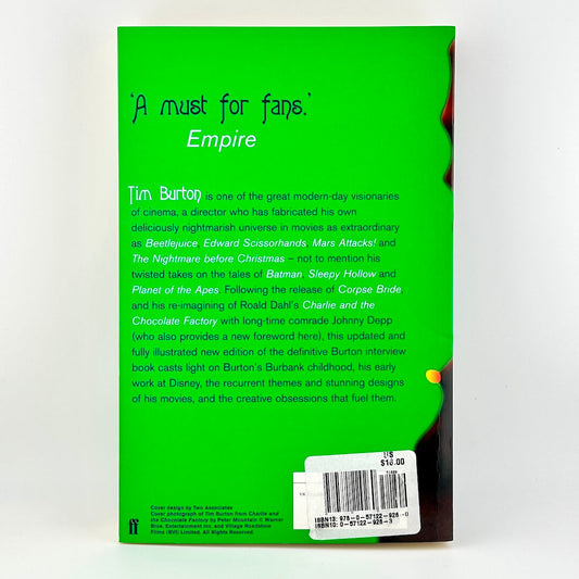 Book back cover with green background and text, featuring a barcode on a white background.