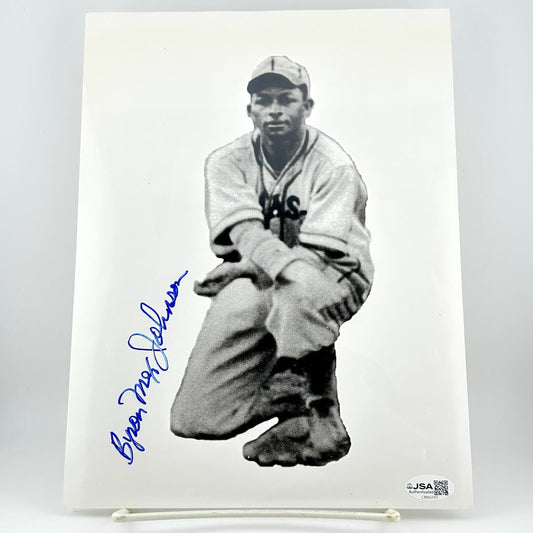 Black and white photo of a baseball player with an autograph on a white background