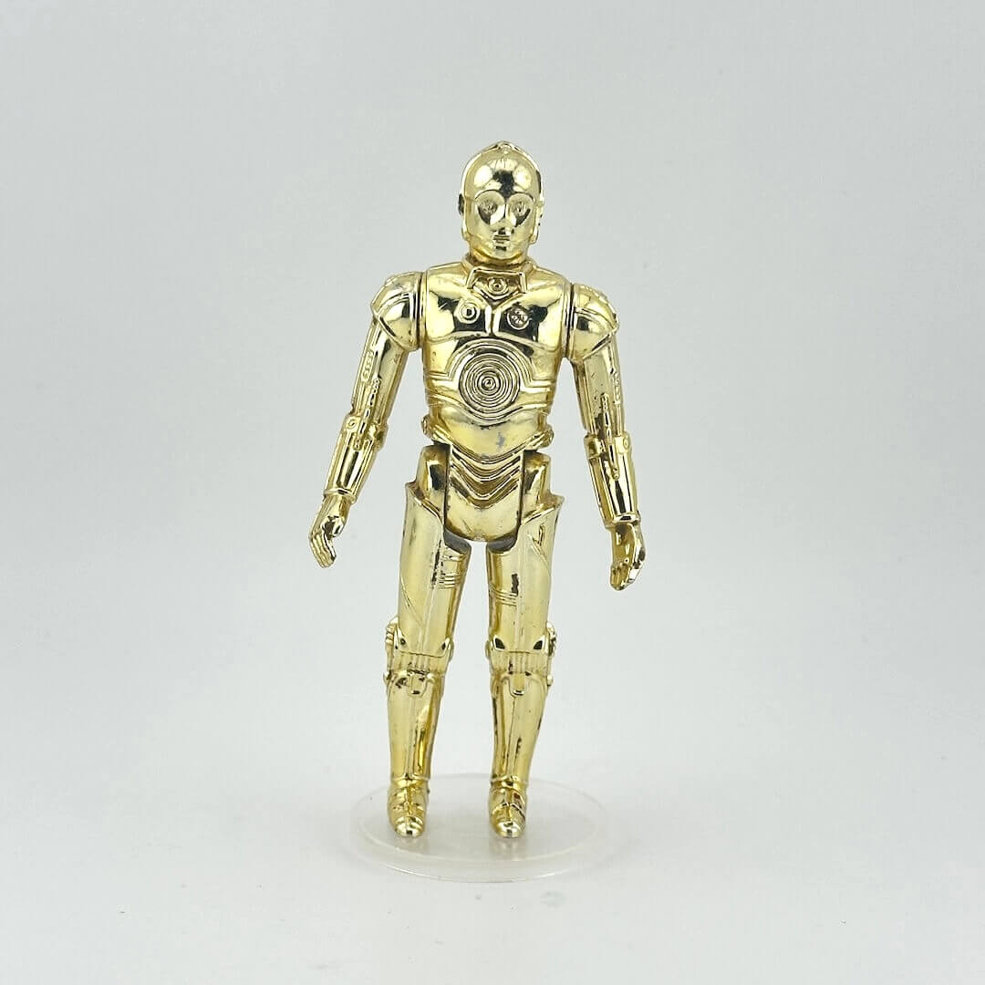 Gold robot figure on a white background