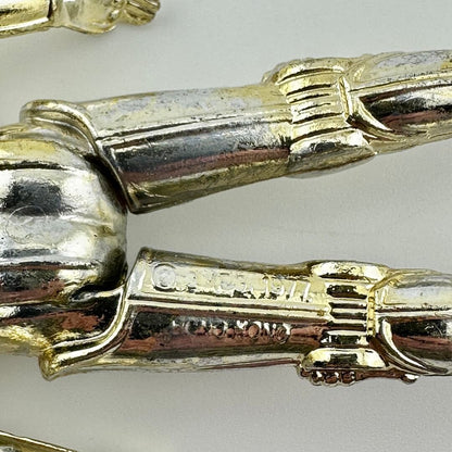Close-up of COO and copyright information embossed on back of figure's leg. 