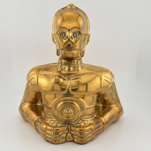 Metallic gold painted coin bank bust of droid, C-3PO front facing view