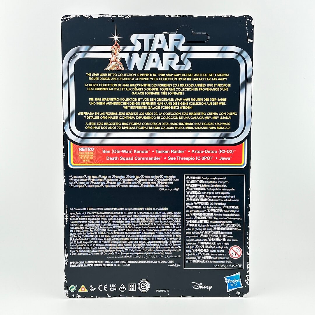 Back of a Star Wars action figure package, showing product details, instructions, and retro branding.
