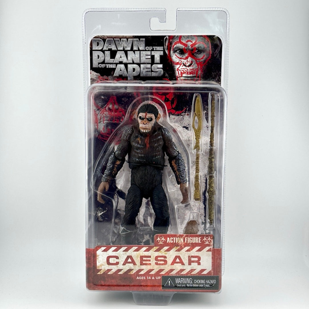 Image of ape action figure with battle painted face & accessories still in plastic packaging, zero damage.