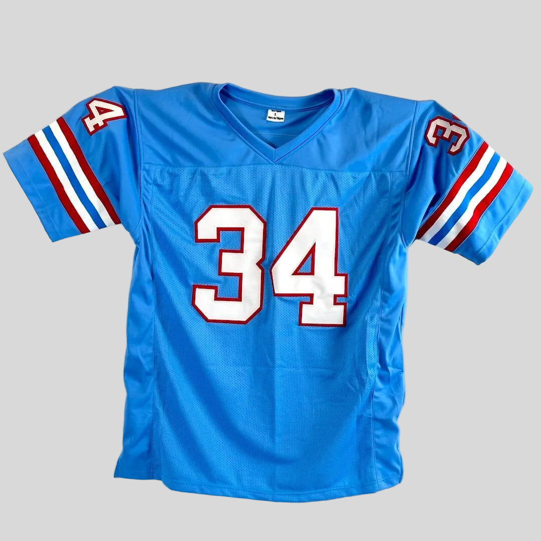 Blue football jersey with red and white accents.