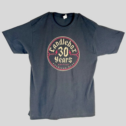 A black crewneck t-shirt with a circular graphic on the chest reading 'Candlebox 30 Years Seattle American Made' in cream and red.
