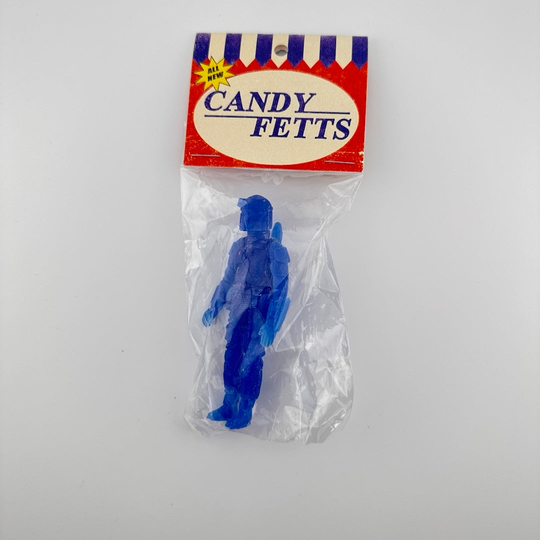 Blue semi-transparent custom figure of Boba Fett classic action figure in packaging, clear plastic bag & card-stock tag.