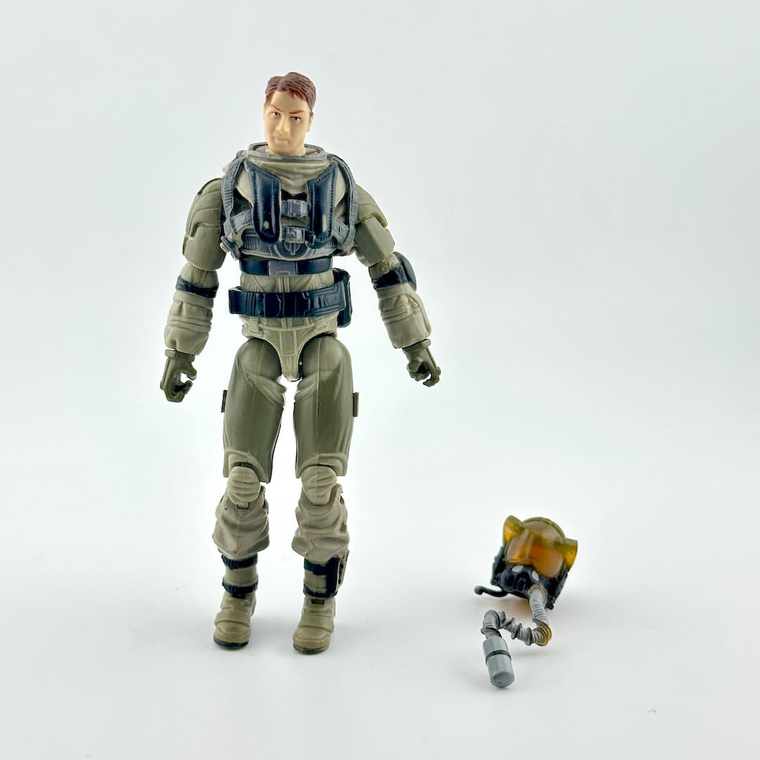 Action figure of man in gray flight suit with aero helmet accessory. 