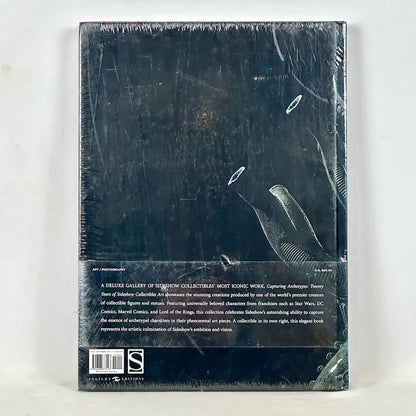 Backside of book cover wrapped in plastic against white background. 