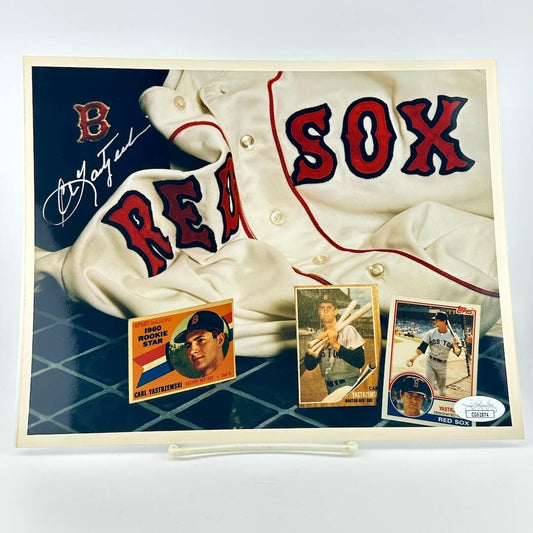 Photograph of memorabilia collage featuring signature of player, JSA authentication sticker in corner. 