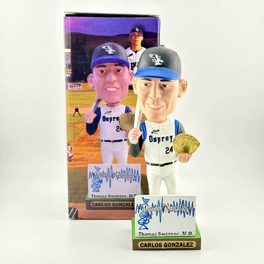 Baseball bobblehead figure with packaging on a white background