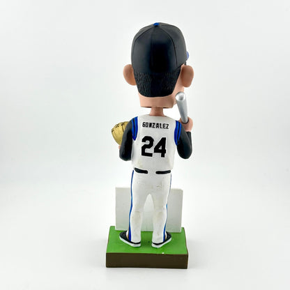 Bobblehead of a baseball player in a white uniform with the number 24 on a white background