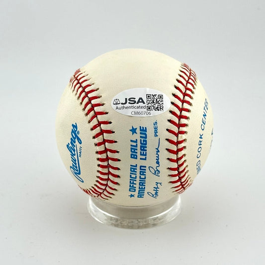 Baseball with Rawlings logo and JSA authentication label on a white background