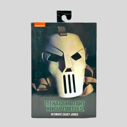 Package of TMNT Casey Jones figure with hockey mask on front and Nickelodeon branding against white background. 