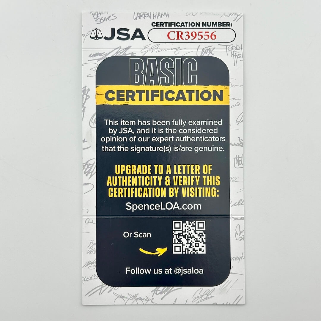 A JSA Basic Certification card with a dark navy blue central panel, yellow and white text, and a QR code.