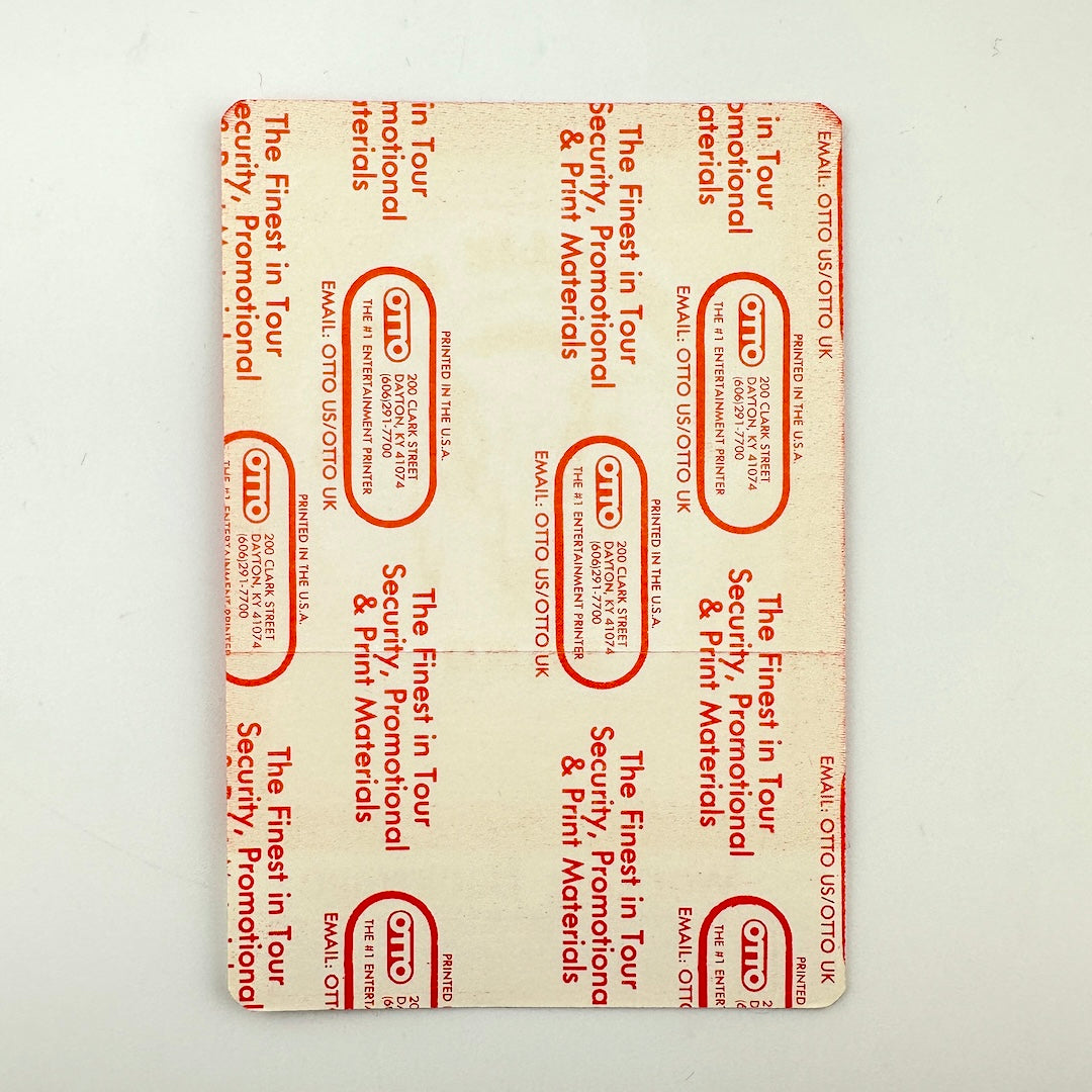 Backside of pass showing intact paper backing and mint condition. 