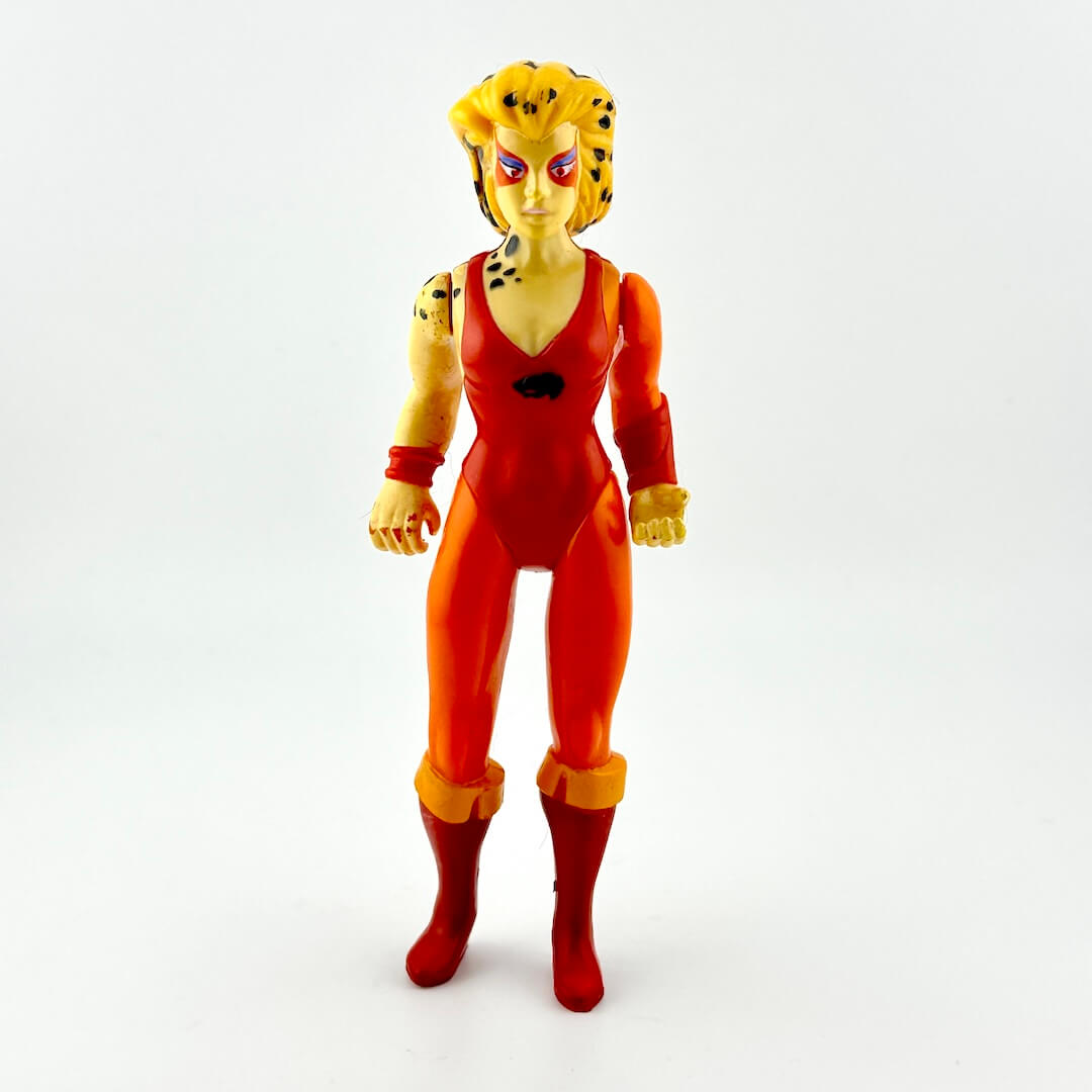 Action figure in a red and yellow costume on a white background