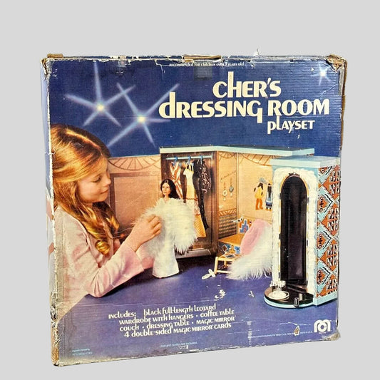 Box for Cher's Dressing Room playset with a girl and doll on a white background