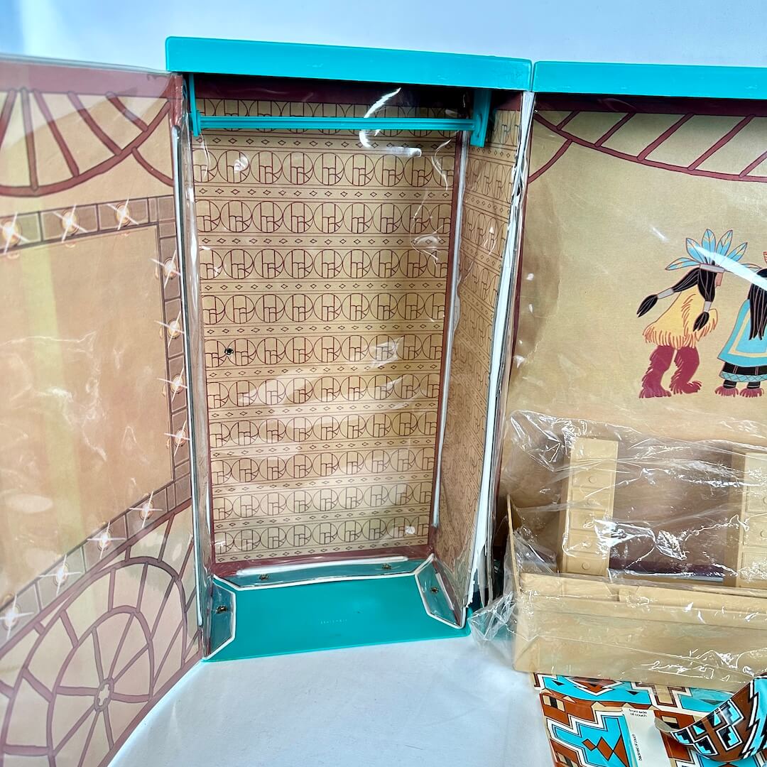 Left side of dressing room playset with geometric pattern.