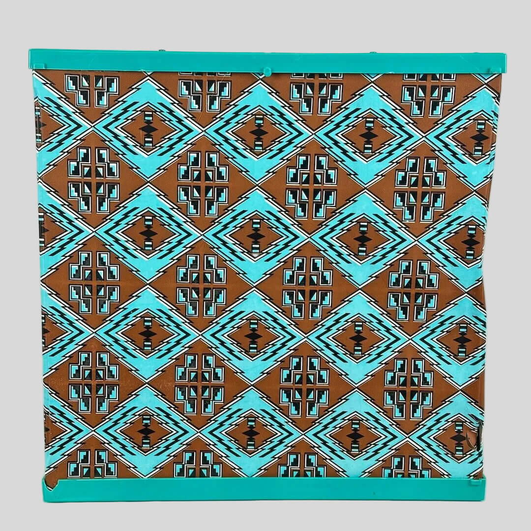 Patterned box with turquoise border on a white background