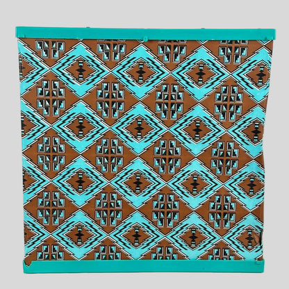 Patterned box with turquoise border on a white background