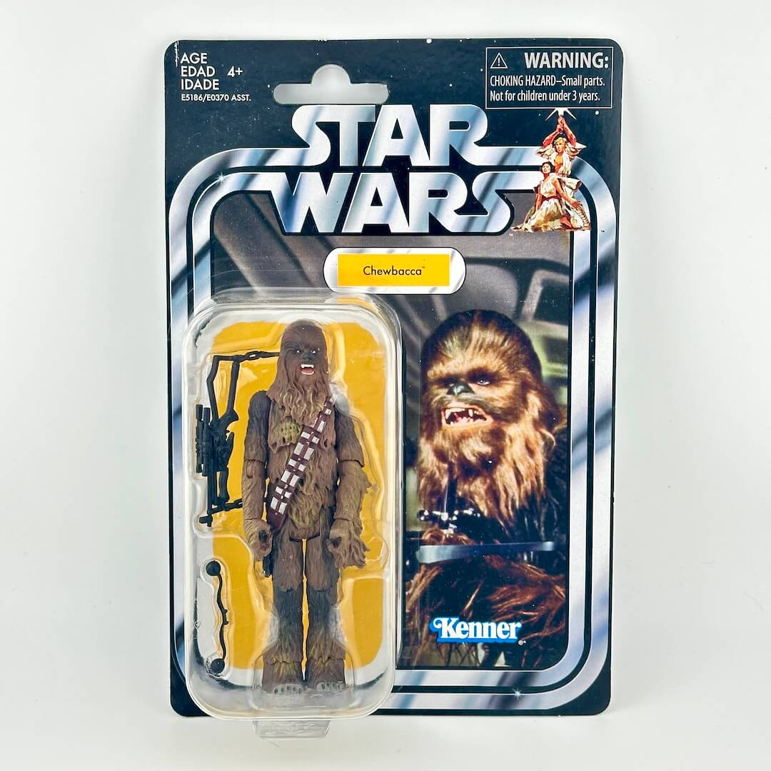 Star Wars Chewbacca action figure in its original carded packaging, featuring Chewbacca in brown fur.