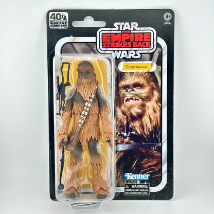 Star Wars action figure in its original blister packaging with retro-style card back with figure and accessories. 
