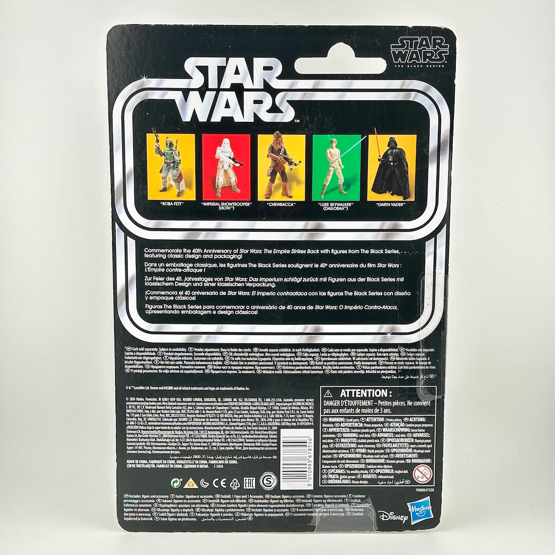 Star Wars action figure packaging back panel with other figure images, product information and warning labels. 