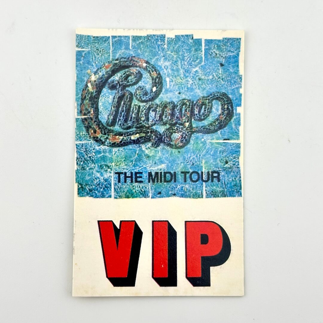 VIP ticket for 'The Midi Tour' by Chicago on a textured blue and beige background