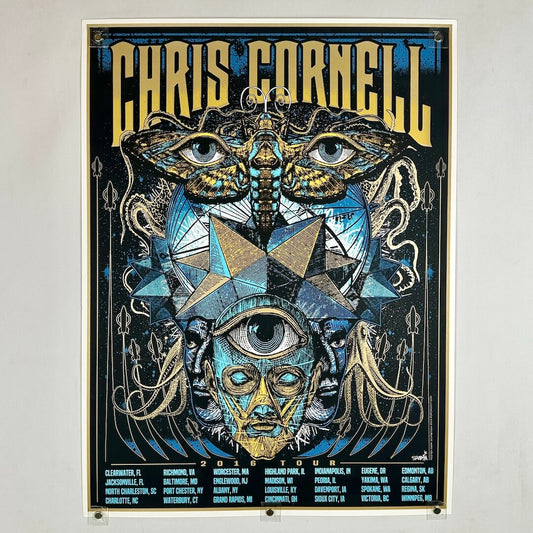 Colorful tour poster with with blue nature designs with gold accents throughout. 