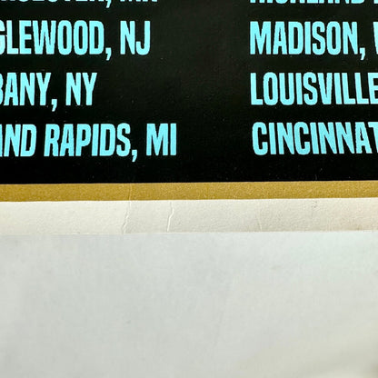 Creases at bottom center of poster. 