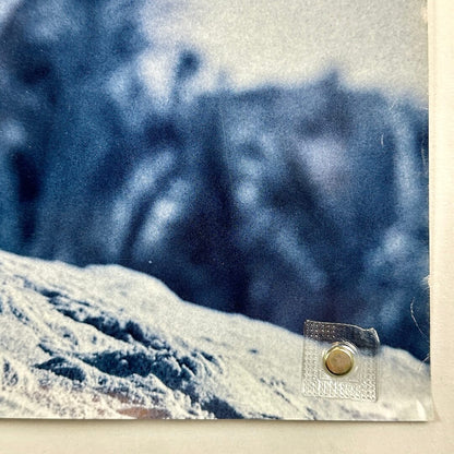 Bottom right corner with some edge wear and rolled corner. 